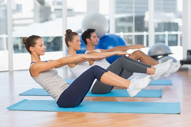 cour-pilates Séance collective de pilates par Sandrine Gautier